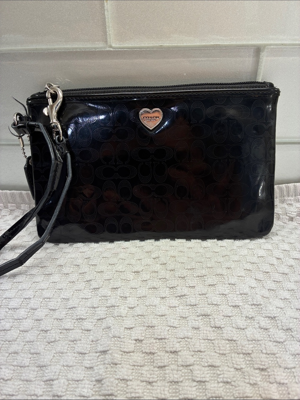 Coach Glossy Black Patent Wristlet with Heart Emblem